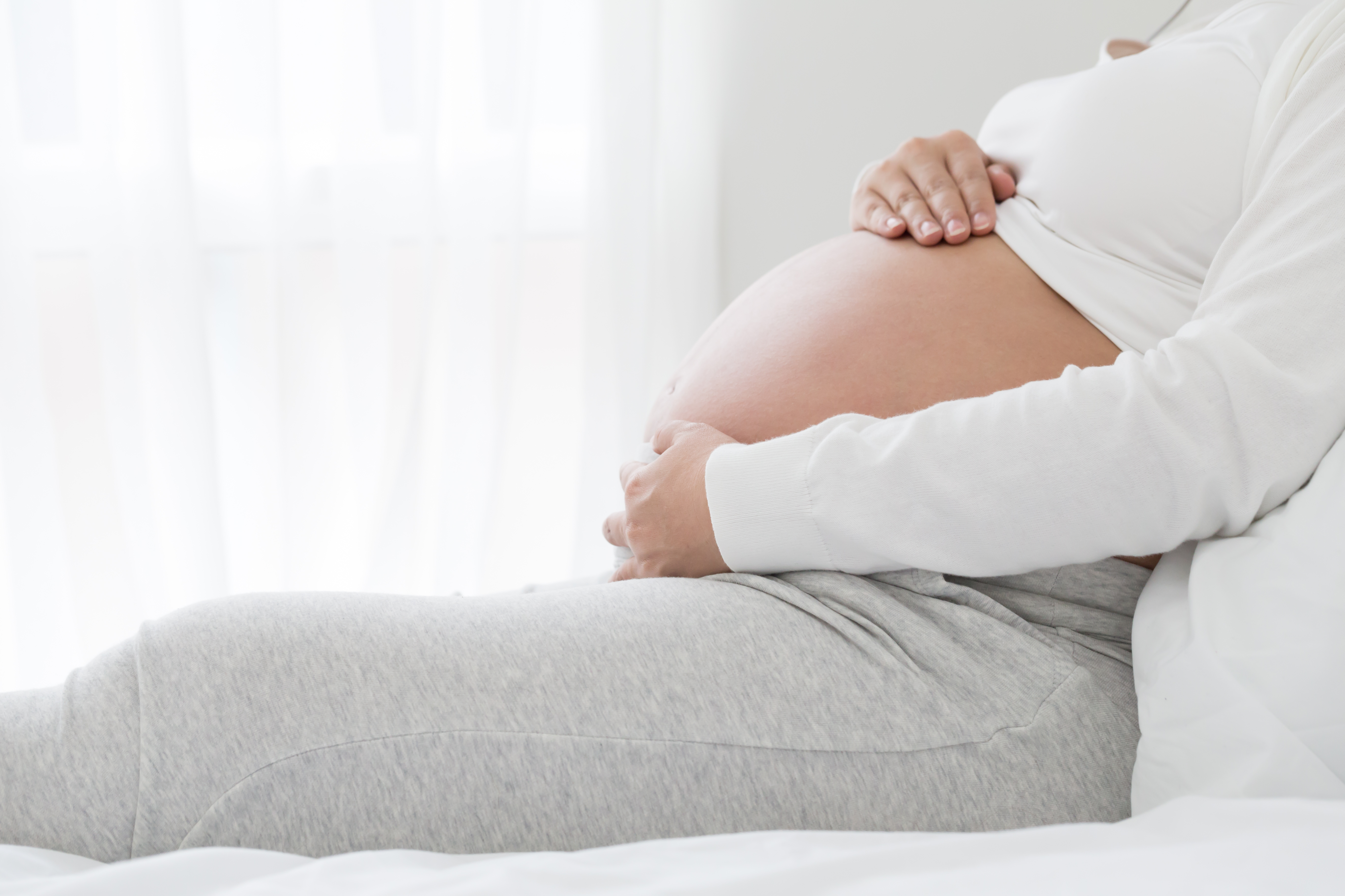 Strain of abdominal muscles during pregnancy, Preterm labor and pregnant women health concept Strain of abdominal muscles during pregnancy, Preterm labor and pregnant women health concept